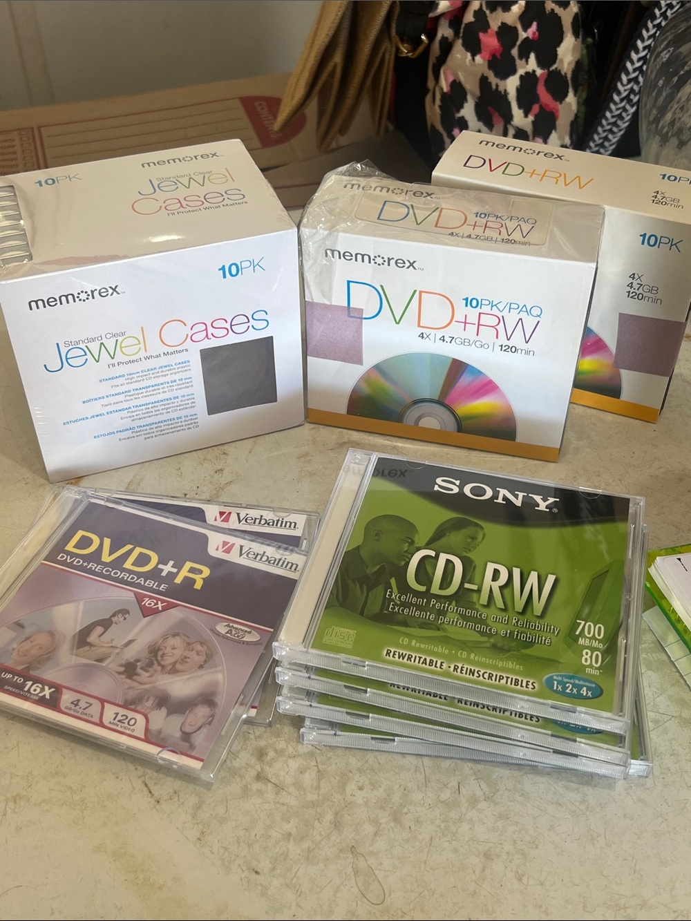 Assortment of blank DVD’s/CD’s and cases